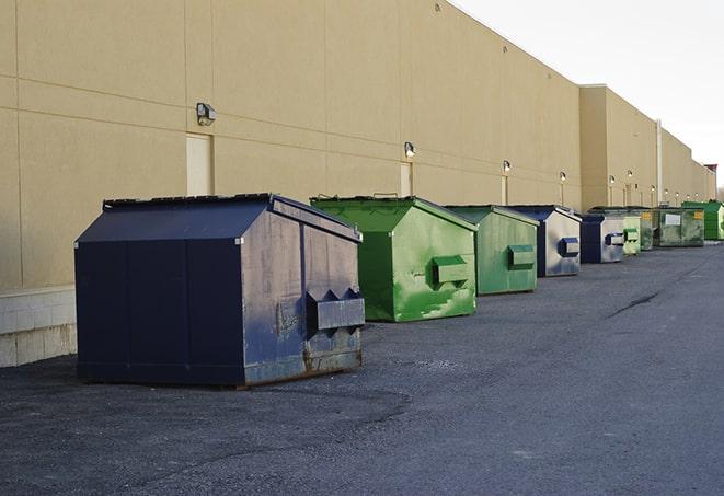 an empty dumpster ready for use at a construction site in Albertson NY